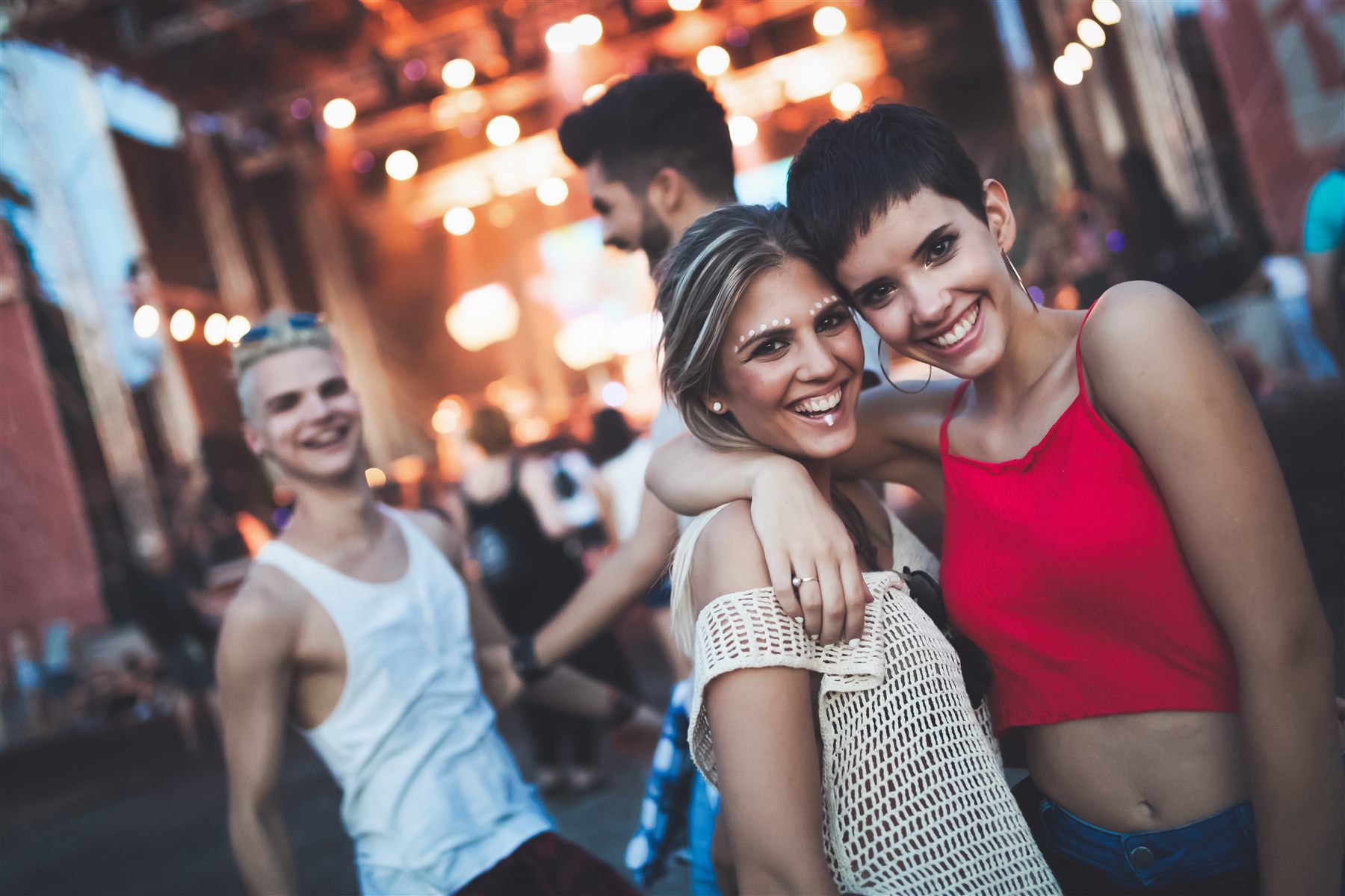 Friends at a Red Sea concert and nightlife event