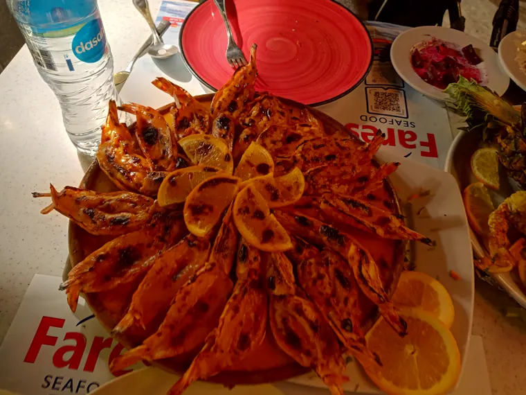 Grilled seafood on a Cairo restaurant table